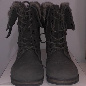 Pair of gray high top shoes